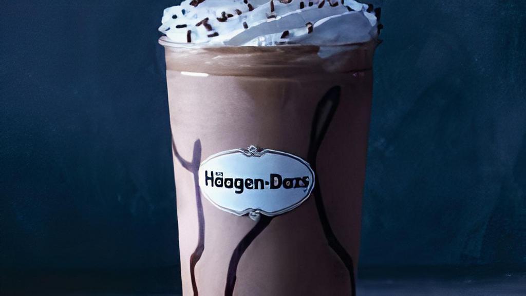 Belgian Chocolate Milkshake · Belgian chocolate ice cream surrounded by ribbons of hot fudge topped with whipped cream and chocolate sprinkles. Served with toppings.
