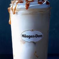 Dulce De Leche Milkshake · Sweet caramel ice cream blended and topped with whipped cream and warm caramel. Served with ...