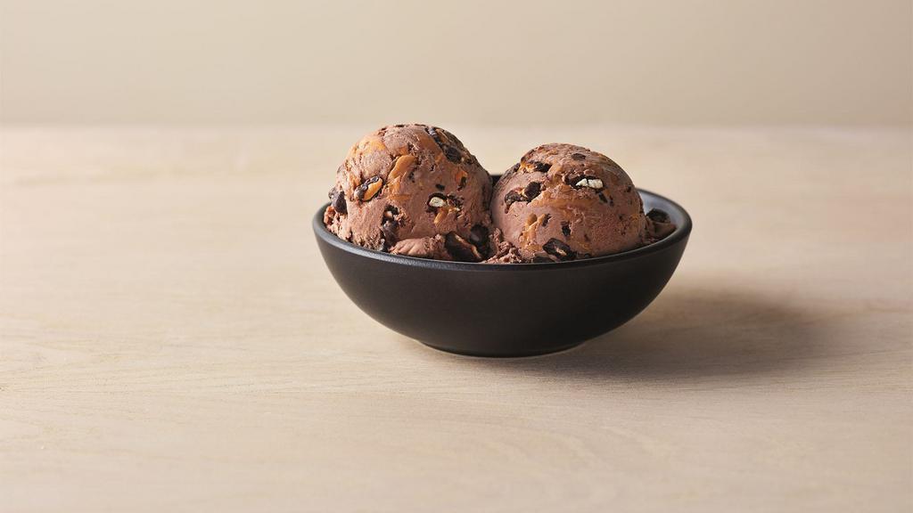 Chocolate Peanut Butter Pretzel – Limited Time Only · Classic Chocolate ice cream packed with thick, creamy peanut butter and complemented by crunchy, slightly salty pretzel pieces.