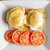 Eggs Benedict · Two Poached Eggs on an English Muffin with Canadian Bacon and Hollandaise Sauce. Served with...