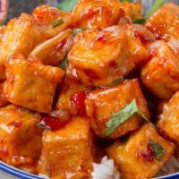 Spicy Orange Tofu 陈皮豆腐 · Fried tofu with spicy orange sauce.