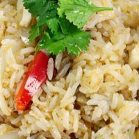 Tom Yum Fried Rice · Hot and spicy. With herb paste, onion and chili.