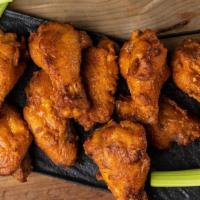 Just Wing It · crispy buttermilk marinated boneless chicken wings, served with carrots, celery & ranch or b...