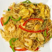 Singapore Rice Noodle​ · Spicy. Sliced chicken, shrimp, sautéed with bell peppers, onion, bean sprouts & egg strips i...