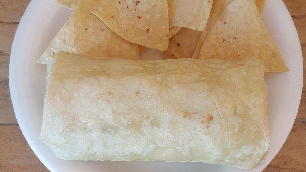 Meat, Beans, & Rice · Classic Burrito with Choice of Meat, Refried Beans and Spanish Rice.