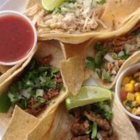 4 Street Tacos Special / 20 Oz Drink · Four mini tacos with any meat, topped with onions, cilantro, and a drink.