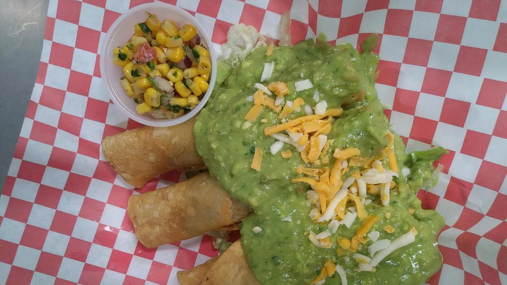 3 Taquitos · 3 Large Taquitos filled with meat covered in Guacamole