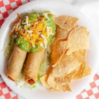 2 Taquitos · Two Large Taquitos with guacamole.