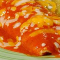 Enchilada · Choose from Beef, Chicken or Pork or cheese filling smothered in melted Jack & Cheddar chees...