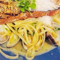 Linguine & Clams · Clams, parsley, and garlic in a lemon butter sauce. Topped with parmesan cheese and grilled ...
