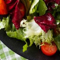 House Salad · Organic greens with cucumber, tomatoes, radish, crostinis, and white balsamic vinaigrette.