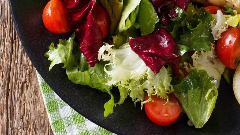 House Salad · Organic greens with cucumber, tomatoes, radish, crostinis, and white balsamic vinaigrette.