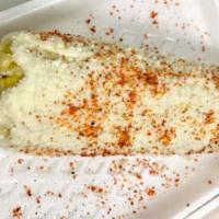 Elotes · CORN, MAYONNAISE, COTIJA CHEESE, TAJIN