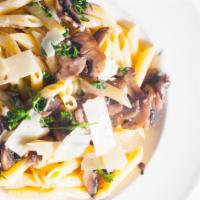 Penne Alfredo · Sautéed mushrooms, garlic, parsley, and alfredo sauce.