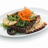 Grilled Octopus · Spanish octopus, wild arugula, roasted pee wee potatoes, lemon dressing and shredded carrots.