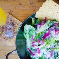 Encontro Caesar Salad · Little gem lettuce, asiago crisps, pickled red onions.
