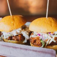 Pulled Pork Sliders · Shredded duroc pork, coleslaw, house made BBQ sauce, brioche bun.