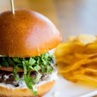 Lamb Burger · House ground lamb, tzatziki, brandywine tomato, shredded romaine, brioche bun.