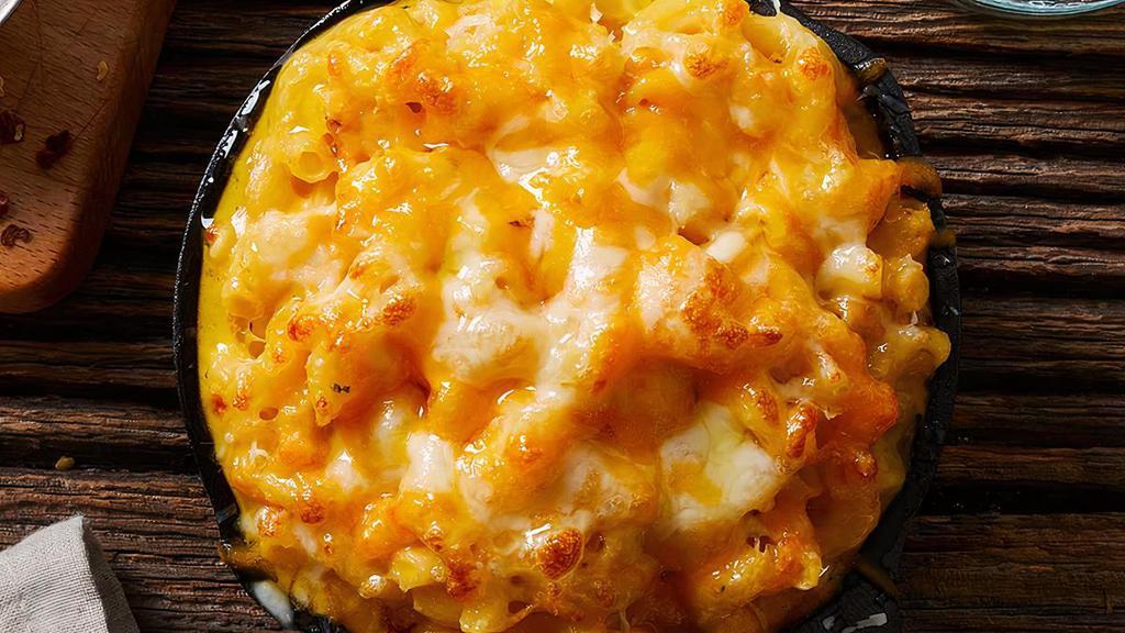 Classic Mac · Elbow noodles with a rich macaroni and cheese sauce.