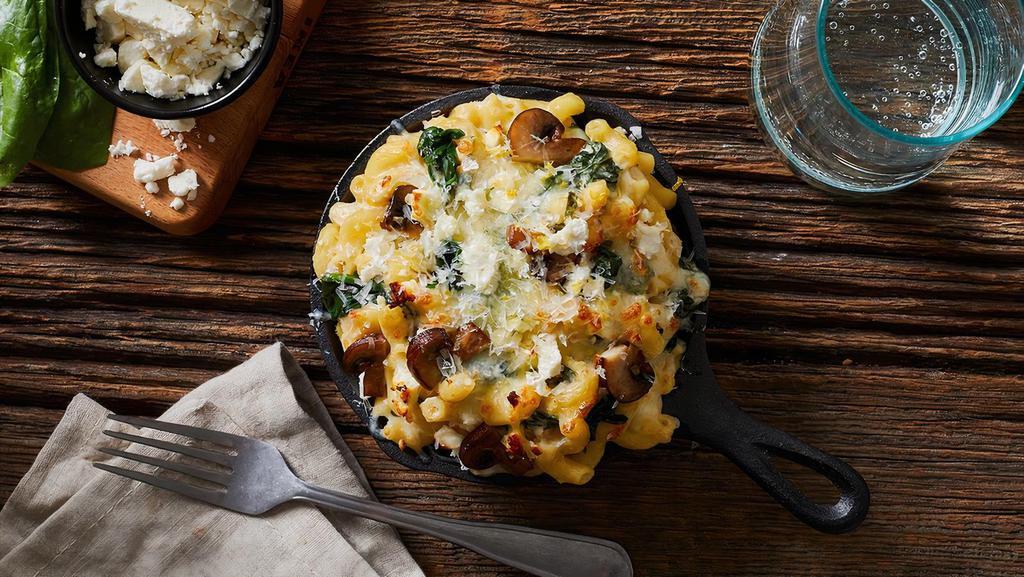 Spinach & Feta Mac · Elbow noodles with a rich mac and cheese sauce, spinach, feta cheese, and black olives.