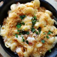 Shrimp Mac · Saucy Mac with Shrimp sauteed in a white wine sauce.