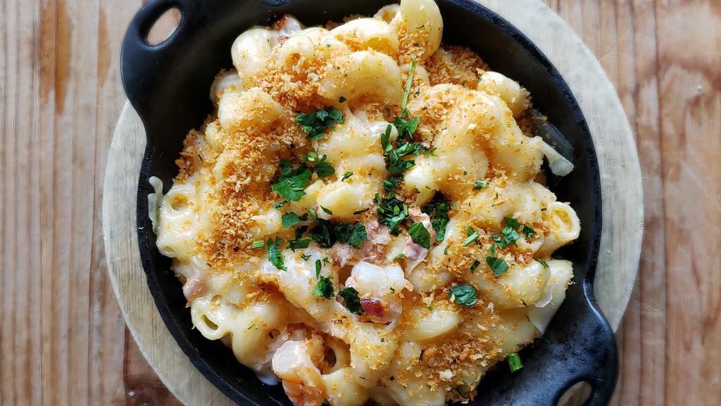 Shrimp Mac · Saucy Mac with Shrimp sauteed in a white wine sauce.