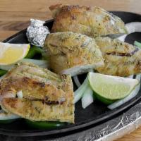 Chicken Tandoori · Gluten-free. Yogurt marinated and specially spiced young chicken legs and things grilled in ...