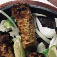 Lamb Boti Kabab · Gluten-free. Yogurt marinated and specially spiced tender lamb chops grilled in the tandoor.