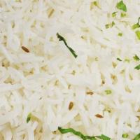 Basmati Rice · Vegan and gluten-free. Basmati rice, boiled and spiced with cloves, cardamom, and cinnamon.