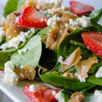 Spinach Salad (Half) · Fresh spinach, caramelized onions, candied walnuts, goat cheese, seasonal berries mixed with...