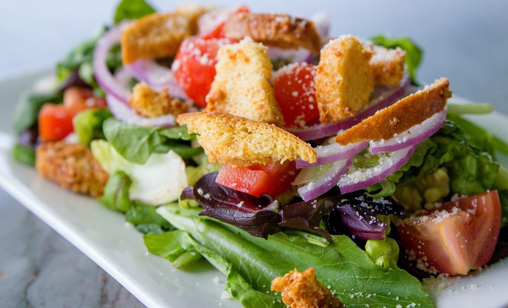 Green Salad (Full) · Mixed greens, sliced tomatoes, grated Parmesan, croutons, and red onions. Served with your choice of dressing.