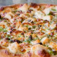 Roasted Garlic Chicken · Roasted chicken, roasted garlic, parsley, scallions, and butter-garlic sauce.