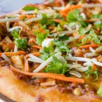 Thai Chicken · Tender chicken, scallions, bean sprouts, shredded carrots, cilantro, peanuts, and spicy pean...
