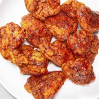 10 Pieces Naked, Breaded Or Boneless Wings · 