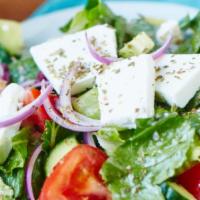 Greek Salad · Crisp mixed lettuce, cucumber, tomato, red onion, feta cheese, kalamata olives, and greek dr...