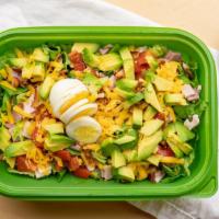 Cobb Salad · Lettuce, Turkey, ham, bacon, cheddar, hard boiled egg, avocado and tomato with your choice o...