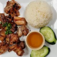 Com Gà Nướng · Grilled chicken over steam rice.