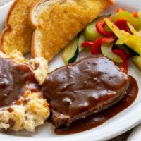 Old Fashioned Meat Loaf · Served with mash potatoes, vegetables and cheese toast.