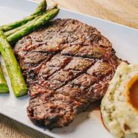 Rib Eye · 16oz Rib Eye grilled to your preference. Served with garlic mashed potatoes and grilled aspa...