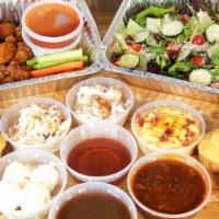 Family Boneless Wings Meal · 24 Boneless Chicken Wings with your choice of 2  dipping sauces, family style house salad w/...
