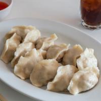 Specialty Pork Dumplings (12Pcs) · our signature dumplings made from scratch. hand rolled skins with our signature pork filling...