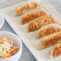 Potstickers (Chicken) · crispy pan-fried dumplings, filled with ground chicken and fresh cabbage. served with our ho...