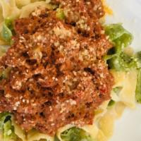 Bolognese Ragu · Traditional homemade tomato sauce with ground beef.