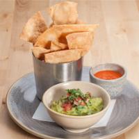 Guacamole With Large Bags Chips · Fresh and tasty with big bag chips.