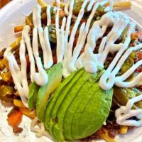 Asada Fries · Estofado, queso, pico de gallo, jalapeño, crema agria y guacamole. / Stew, cheese, pico de g...