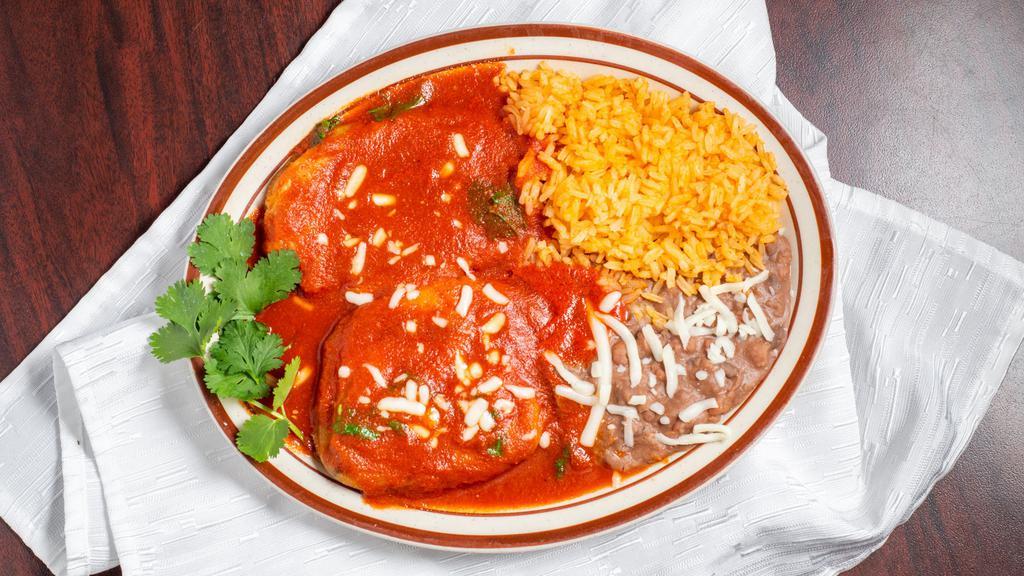 Chiles Rellenos / Stuffed Chilies · Servido con arroz, frijoles y salsa. / Served with rice, beans and sauce