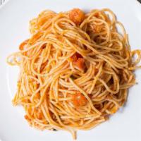 Spaghetti Al Pomodoro Fresco · Spaghetti pasta with garlic, olive oil, and fresh chopped tomatoes.
