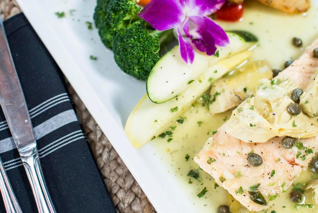 Salmone Piccata · Salmon filet sauteed in lemon sauce with capers and artichokes