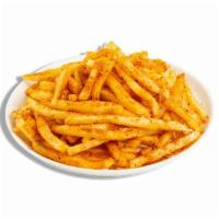 Cheddar Chili-Lime Fries · Thin and crispy golden french fries dusted in a house-made blend of spicy chili-lime cheddar...