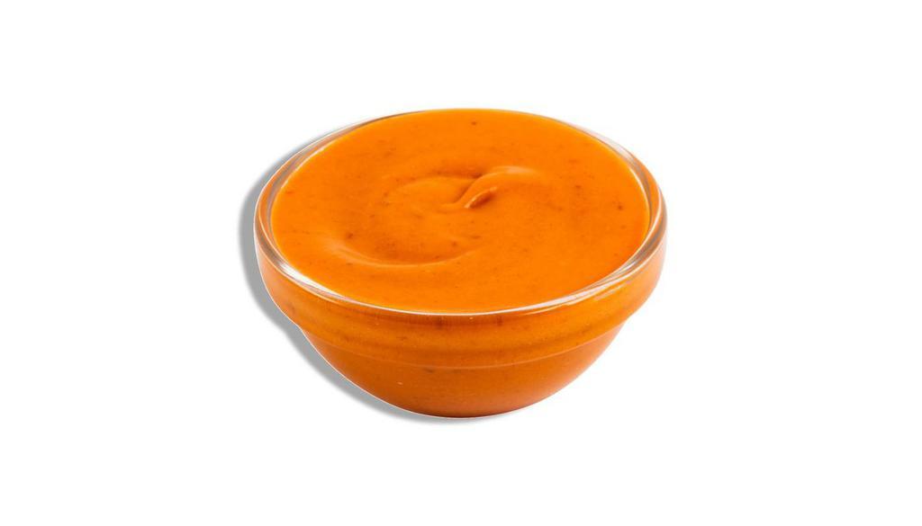 Buffalo Sauce · 2 oz. portion of house made spicy buffalo hot sauce. A perfect blend of Frank's RedHot® sauce, a dash of butter, and a secret blend of spices.